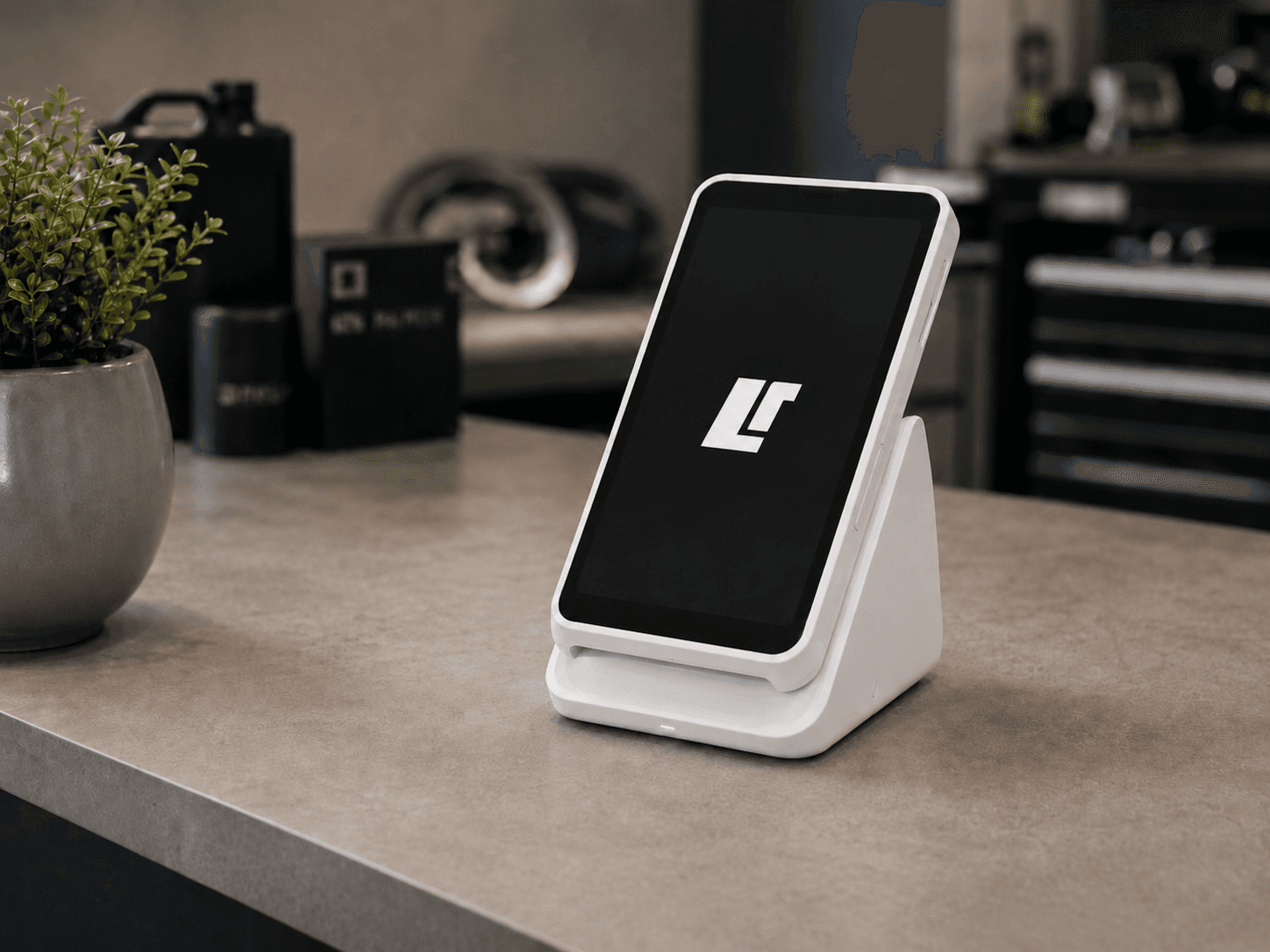 LR Centre branding displayed on a Stripe Terminal device