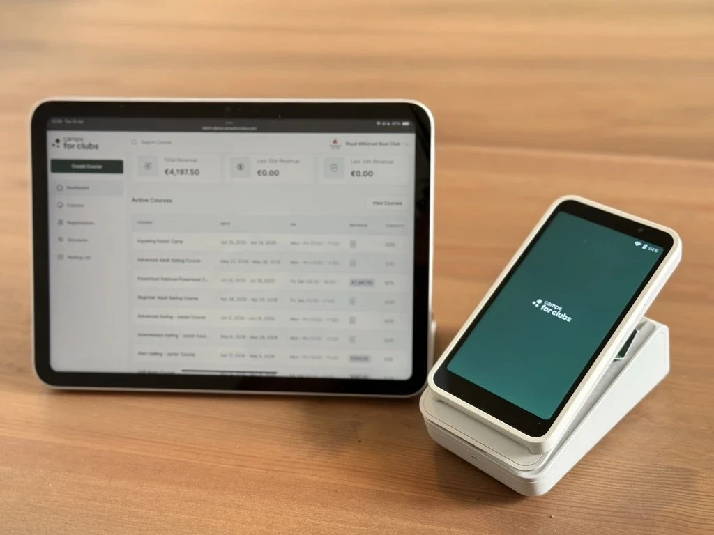 Payment management interface on a tablet beside a branded terminal