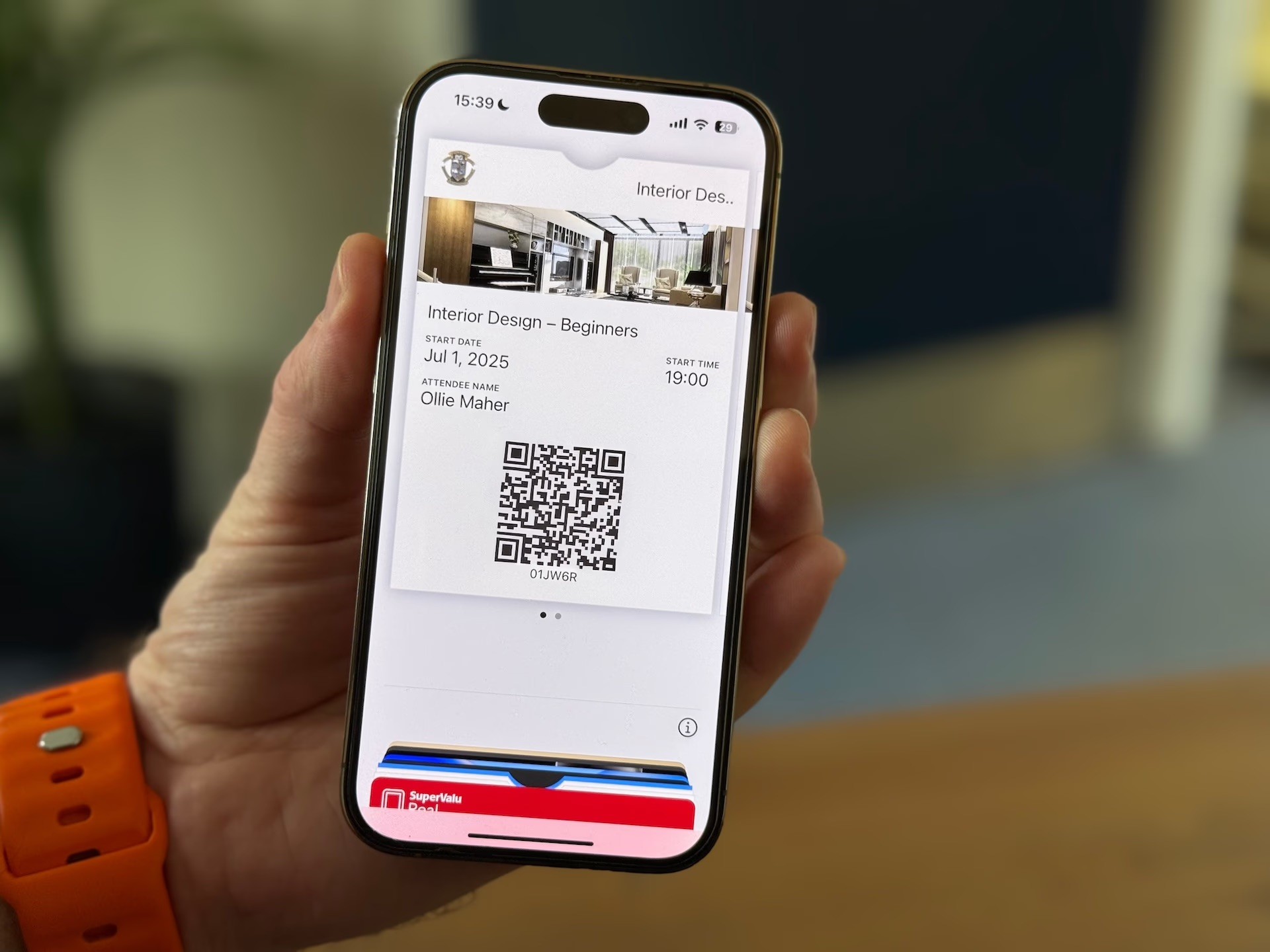 Digital event ticket with a QR code displayed on a phone